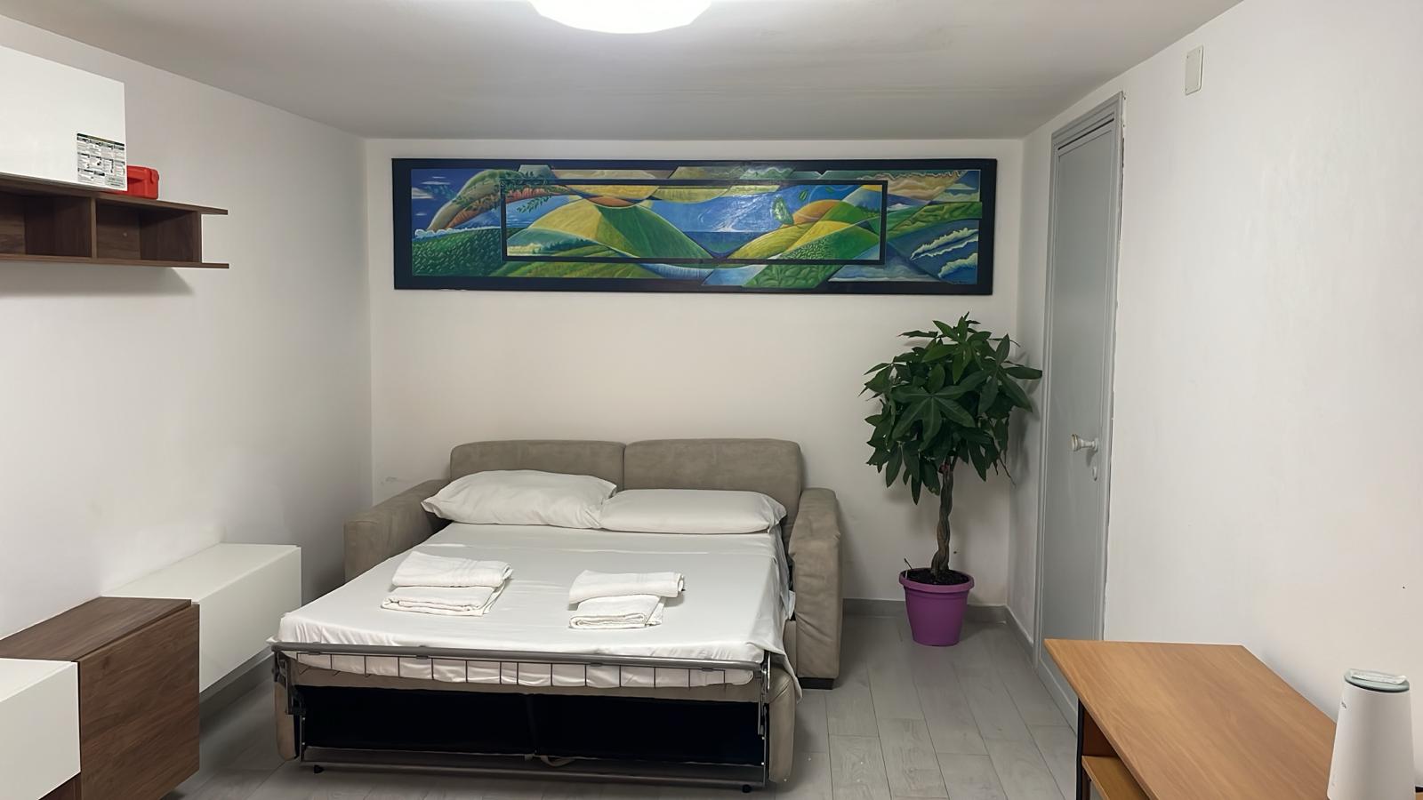 Soggiorno con divano letto